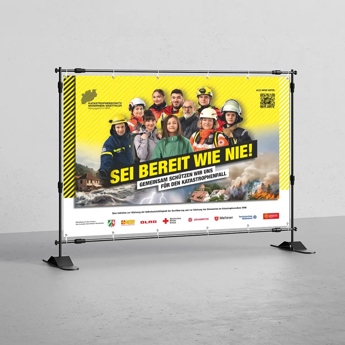 Kampagnenmotiv Sei bereit wie nie auf Bauzaunbanner im grauen Raum